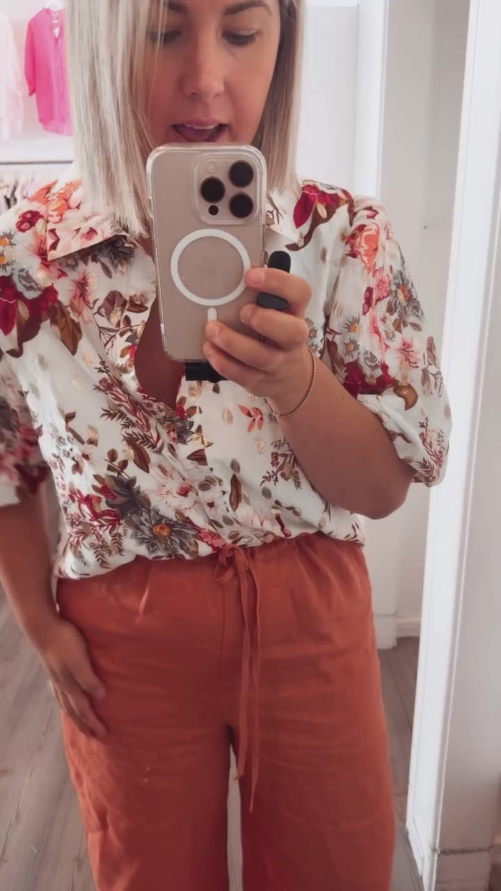 White and gold blouse